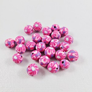 Polymer Clay pink flower pattern beads on white background